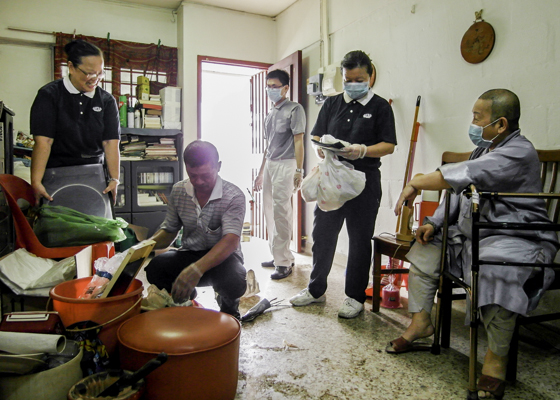 Volunteers Clean Up the Home of an Elderly Nun