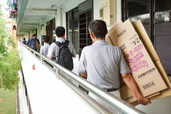 Volunteers were well prepared to clean Grandma Wong’s house and brought along various cardboard boxes of differing sizes to store her items. Photo by Nichelle Chan